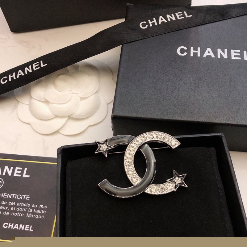 Ch*el brooches